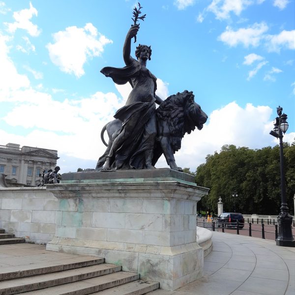 a statue of a man jumping in the air
